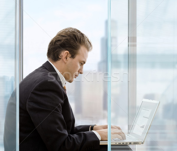 Businessman using laptop Stock photo © nyul