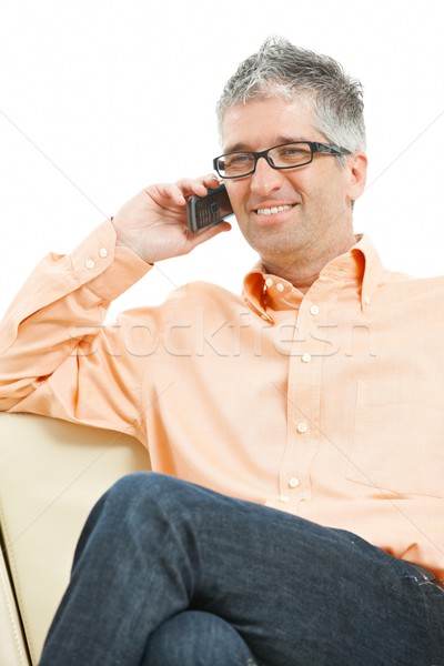 Stock photo: Man talking on mobile phone