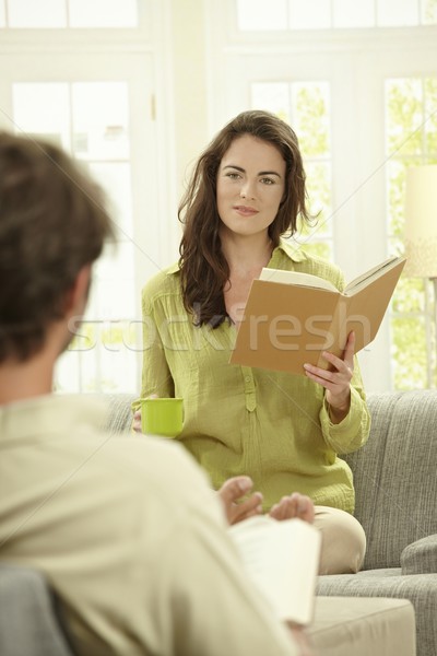 Stock photo: Young woman reading book