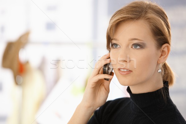 Stock photo: Young woman on mobile