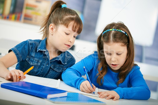Stock photo: Schoolgirls learning in classroom