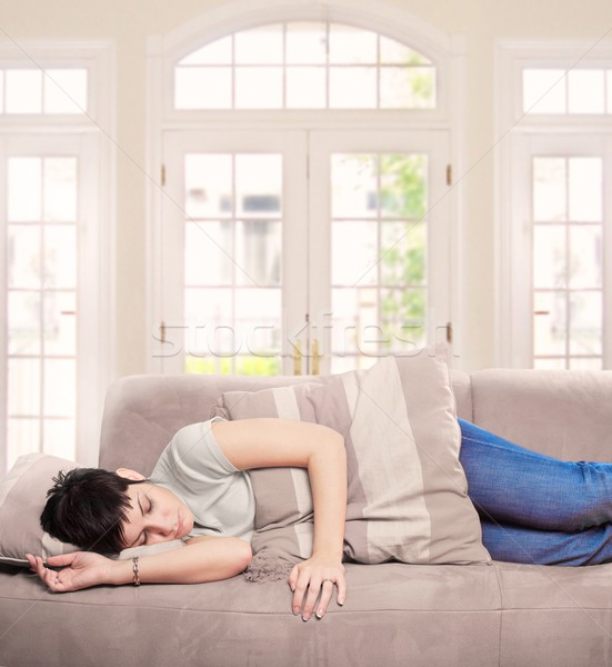 Young woman sleeps on the sofa Stock photo © nyul