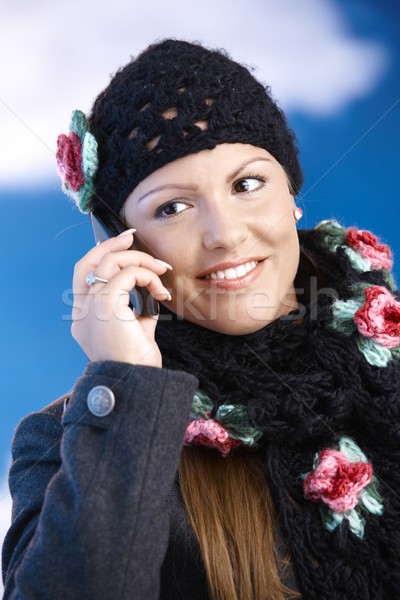Attractive woman in winter clothes with mobile Stock photo © nyul