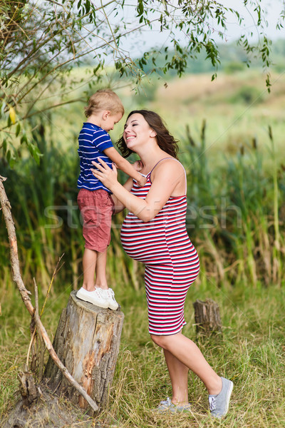 Pregnant mother and her son playing together Stock photo © O_Lypa