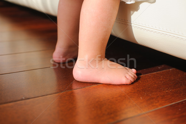 Children's bare feet, beside to bed Stock photo © O_Lypa