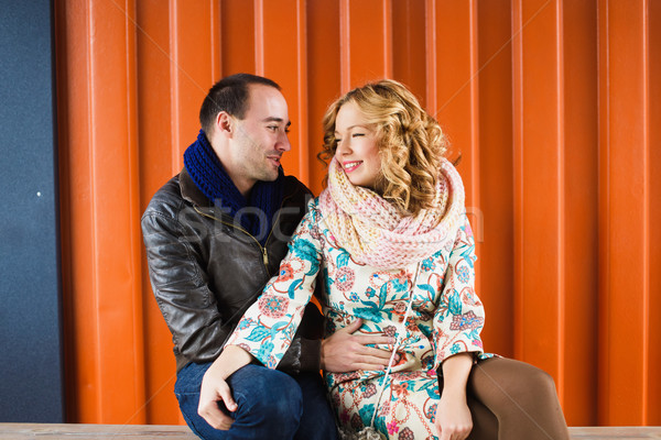 Feliz casal sorridente outro laranja mulher Foto stock © O_Lypa