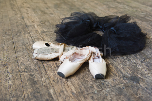 Ballet shoes and tutu on a wooden background Stock photo © O_Lypa