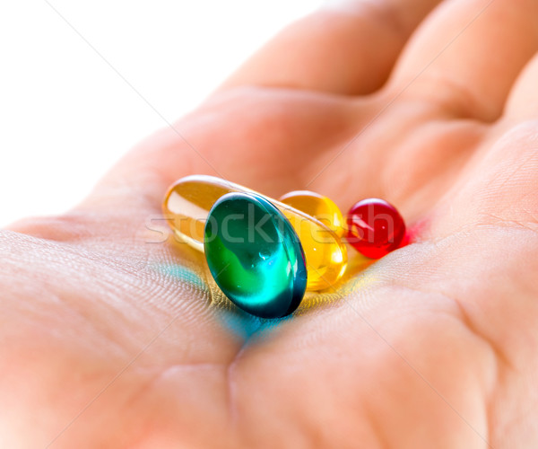 Tabletták kéz közelkép fotó színes orvosi Stock fotó © Obencem