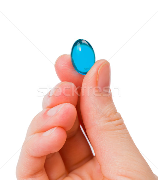 Kék gél kapszula közelkép fotó kéz Stock fotó © Obencem