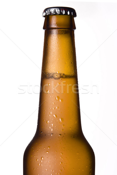 Hideg sörösüveg fehér közelkép sör bár Stock fotó © ocusfocus