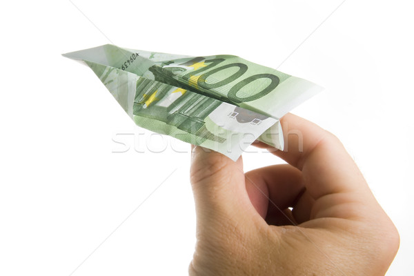 Hand Holding Banknote Paper Plane Stock photo © ocusfocus