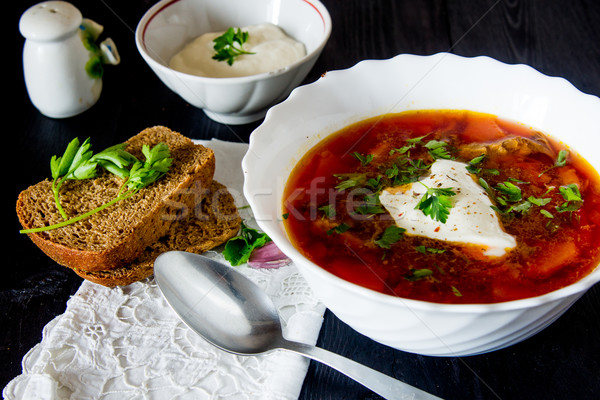 big bowl of borscht with sour cream and herbs Stock photo © oei1