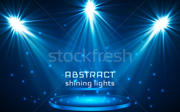 stage spot lighting. magic light. blue vector background Stock photo © olehsvetiukha