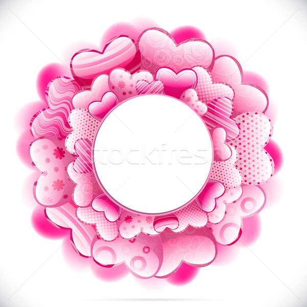 Round frame made of hearts and adorned with various ornaments. Stock photo © OlgaYakovenko