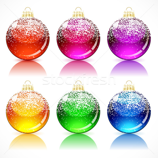 Stock photo: Christmas glass balls with a golden cap and loop, powdered snow.
