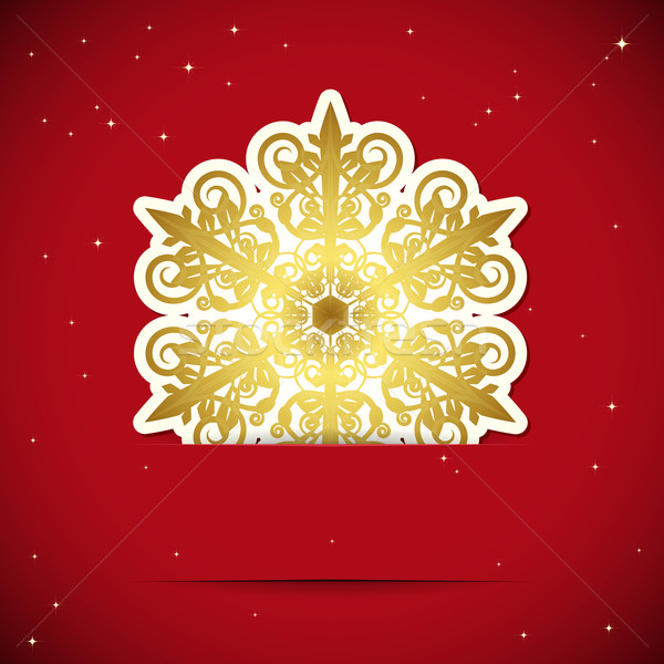 Christmas background. Snowflake inserted into a slot on the pape Stock photo © OlgaYakovenko