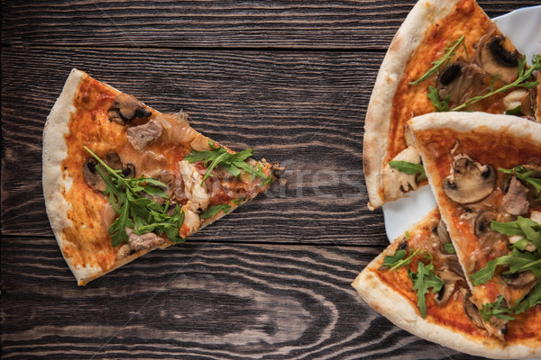Pizza with chicken and mushrooms Stock photo © olira