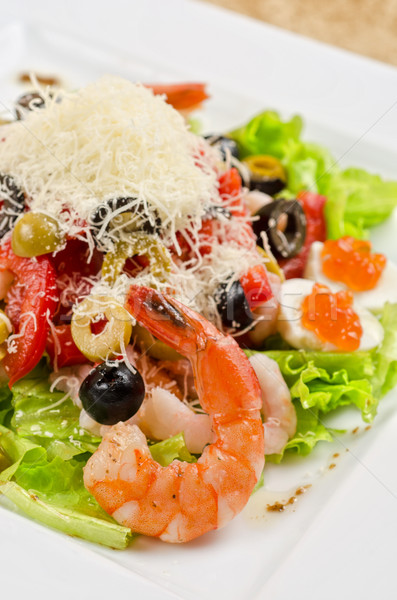 Smakelijk zeevruchten salade kaviaar sla olijfolie Stockfoto © olira