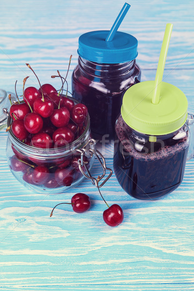Stock photo: Cherry juice with glass of berries