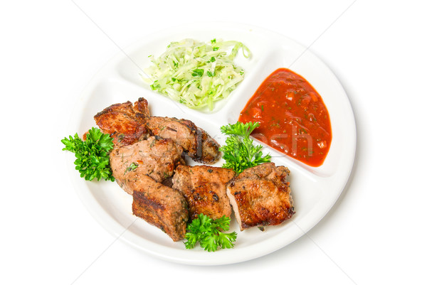 мяса жареное мясо соус овощей изолированный белый Сток-фото © olira