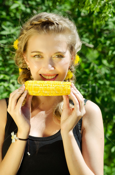 woman eating corn-cob Stock photo © olira