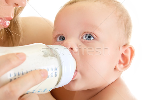 Etetés anya ad ital baba fiú Stock fotó © olira