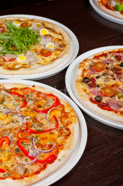 Stok fotoğraf: Pizza · ayarlamak · farklı · tablo · arka · plan · akşam · yemeği