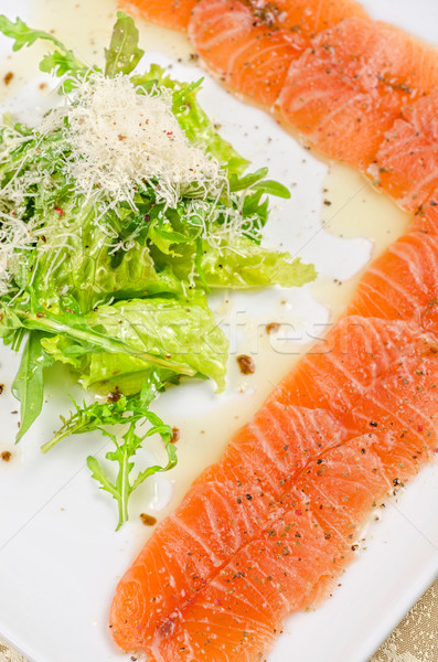 Fish Carpaccio with salad Stock photo © olira