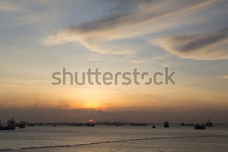 Sonnenuntergang Punkt Continental asia Wasser Rauch Stock foto © oliverfoerstner