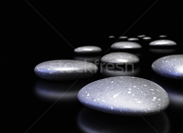 pebbles in a row over black background, border Stock photo © olivier_le_moal
