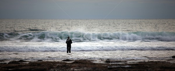 Pescatore mare pesca surf cielo acqua Foto d'archivio © ollietaylorphotograp