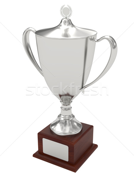 Silver trophy cup on wood pedestal with blank plate Stock photo © oneo