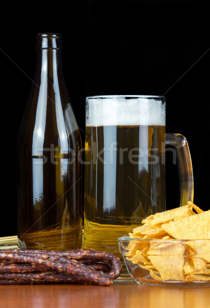 Sör pint sültkrumpli kolbászok búza fekete Stock fotó © oorka