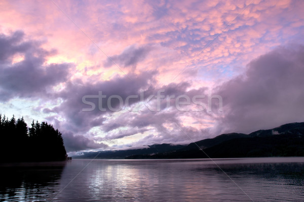 Tó hegy felhők naplemente természet felhő Stock fotó © oorka