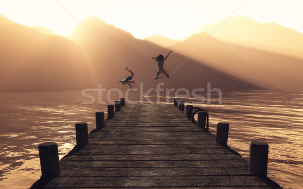 Stock photo: Young couple jumping 