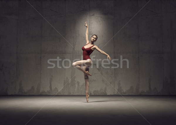 Młodych piękna gimnastyk stwarzające czerwony kostium Zdjęcia stock © orla