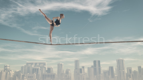 Woman sitting on a rope  Stock photo © orla