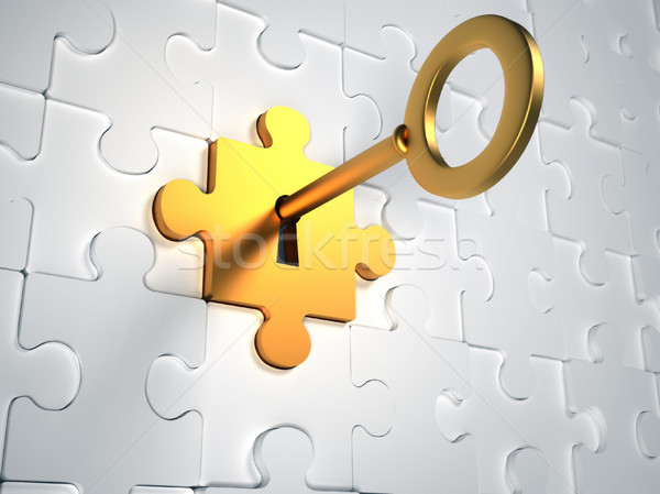 Golden key and puzzle pieces Stock photo © orla