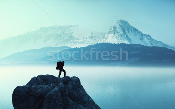 Young man up the mountain Stock photo © orla