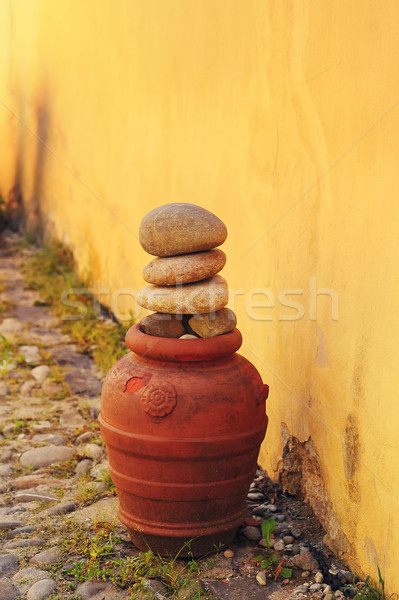 Decorative pottery on a cobblestone street  Stock photo © orla