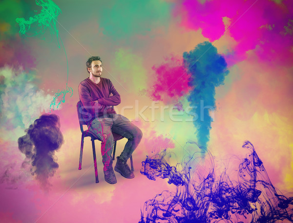Kreativität junger Mann Sitzung Stuhl farbenreich Tinte Stock foto © orla
