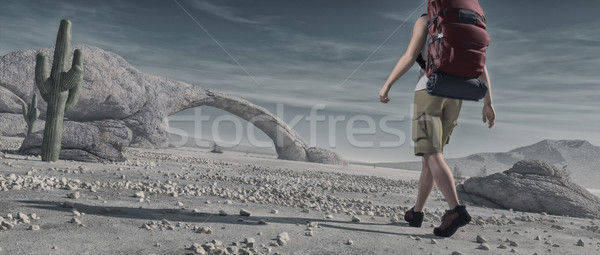 Tourist backpacking through desert.  Stock photo © orla