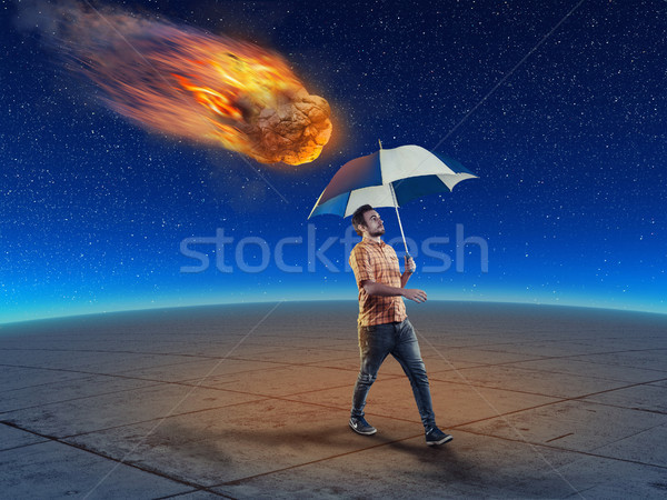 Człowiek parasol spaceru meteor objętych Zdjęcia stock © orla