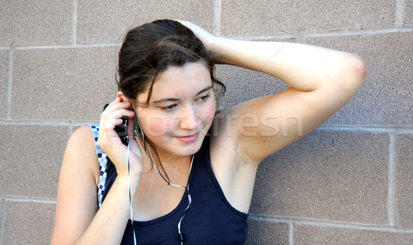 Adolescente femminile parlando telefono cellulare donna donne Foto d'archivio © oscarcwilliams