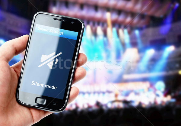 Hand halten Smartphone stumm Sound Konzert Stock foto © pab_map