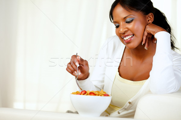 Adult afro-american woman having breakfast Stock photo © pablocalvog