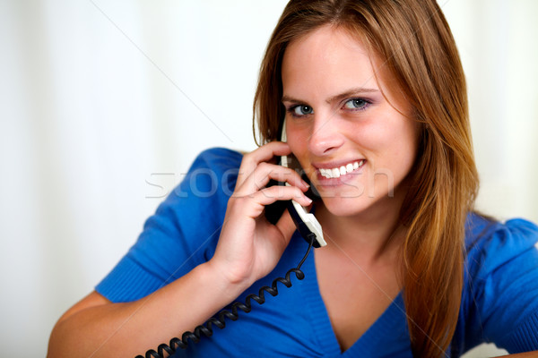 кавказский блондинка улыбаясь телефон портрет Сток-фото © pablocalvog