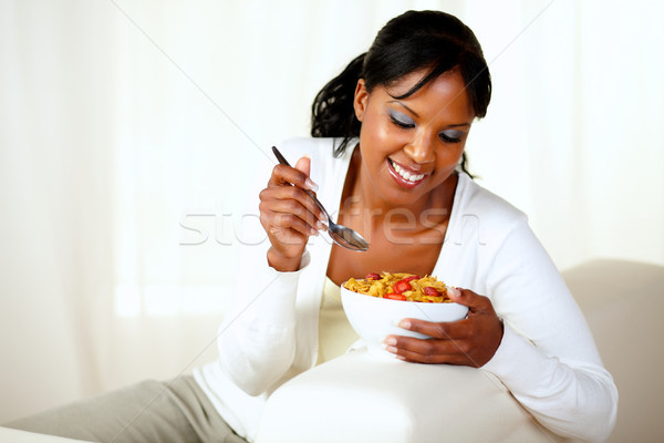 Young black female having healthy breakfast Stock photo © pablocalvog