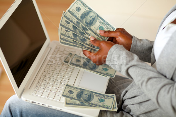 Black woman counting plenty of cash money Stock photo © pablocalvog