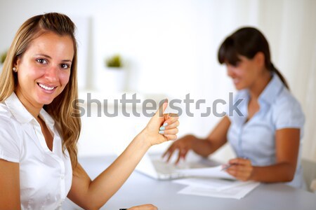 Blonde businesswoman saying great work Stock photo © pablocalvog